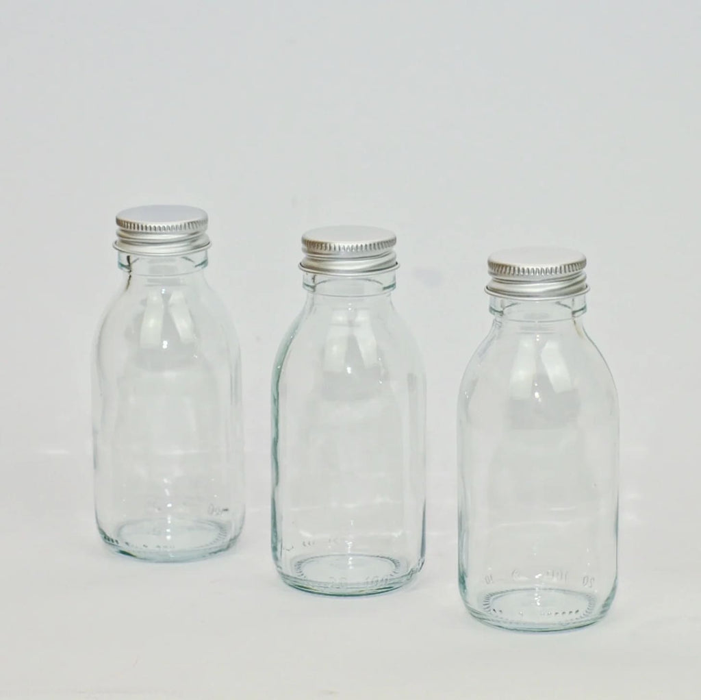 Through the window Clear Glass Refillable Bottles - Glass Refill Containers