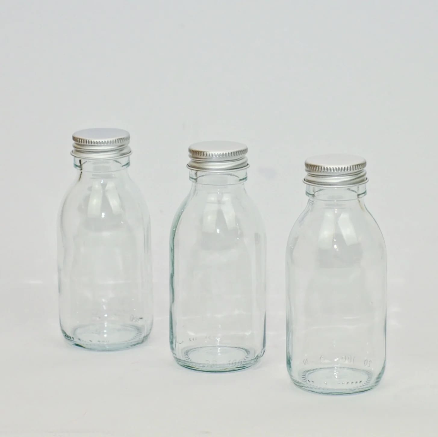 Through the window Clear Glass Refillable Bottles - Glass Refill Containers
