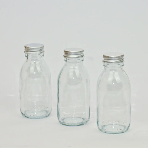 Through the window Clear Glass Refillable Bottles - Glass Refill Containers